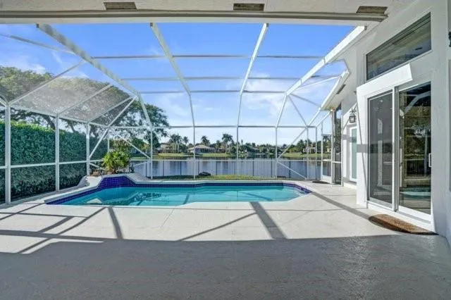 a bathroom with a sink toilet vanity and shower