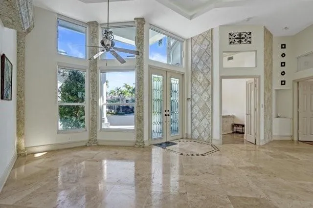 a view of a hallway with windows