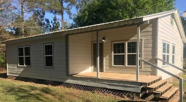 a view of a house with a large window