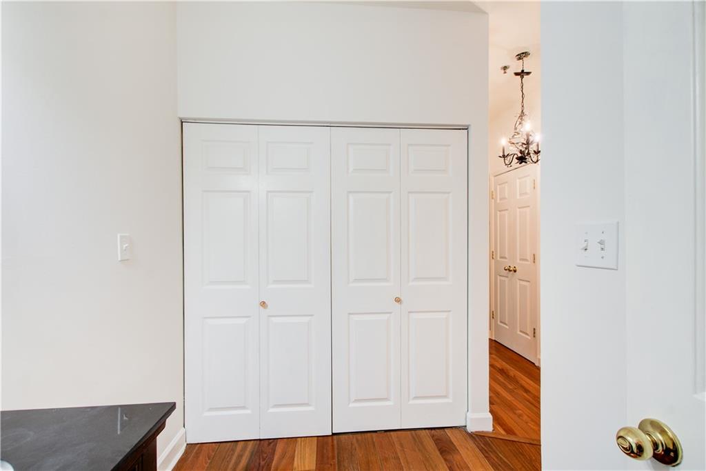 2865 Lenox Road Northeast, Unit 102 Atlanta, GA 30324 - Photo 10 of 35 a view of an entryway with wooden floor
