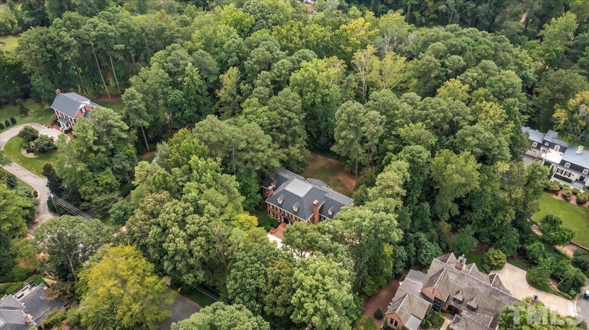 1213 Marlowe Road Raleigh, NC 27609 - Photo 2 of 30 an aerial view of a house with a yard and trees