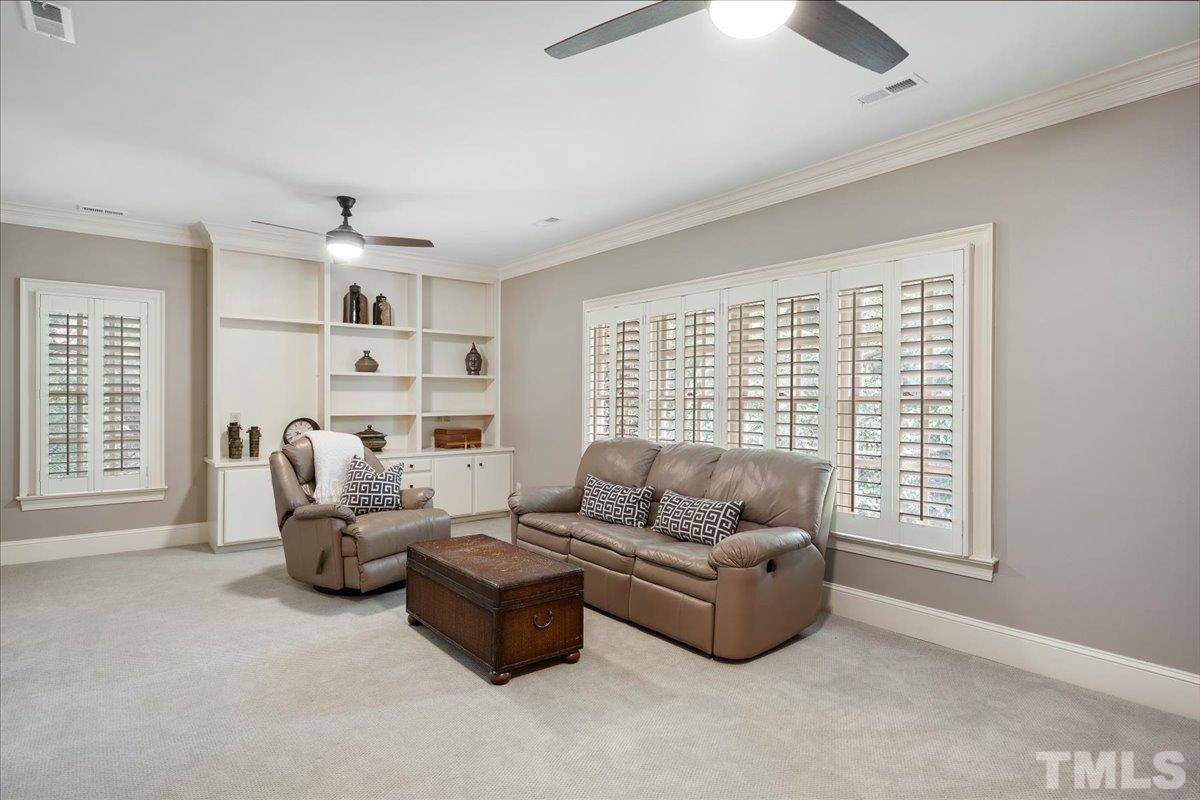 1213 Marlowe Road Raleigh, NC 27609 - Photo 18 of 30 a living room with furniture and a large window