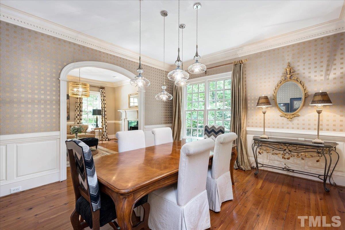1213 Marlowe Road Raleigh, NC 27609 - Photo 6 of 30 a view of a dining room with furniture window and wooden floor