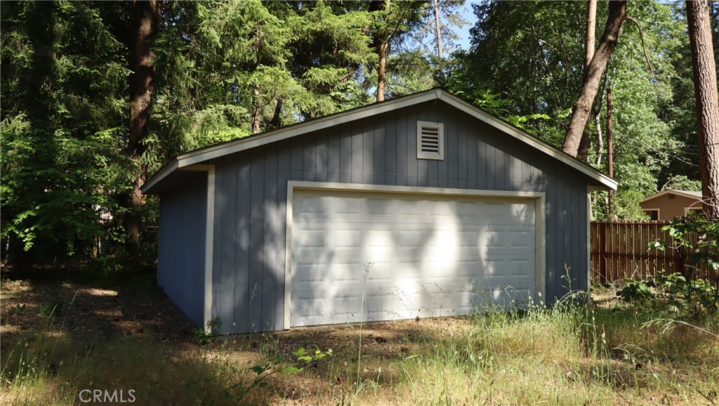 10466 Redwood Road Middletown, CA 95461 - Photo 12 of 14 a backyard of a house with lots of green space