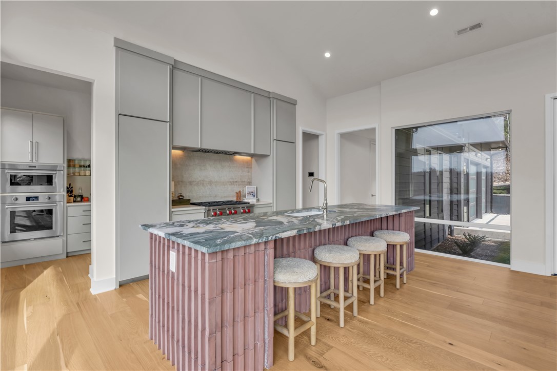 127 Crosswind Court Sunset, SC 29685 - Photo 12 of 49 This spacious kitchen features ample counter space and abundant natural light.
