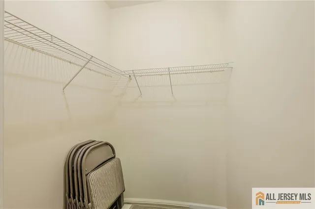 a view of a balcony with chairs