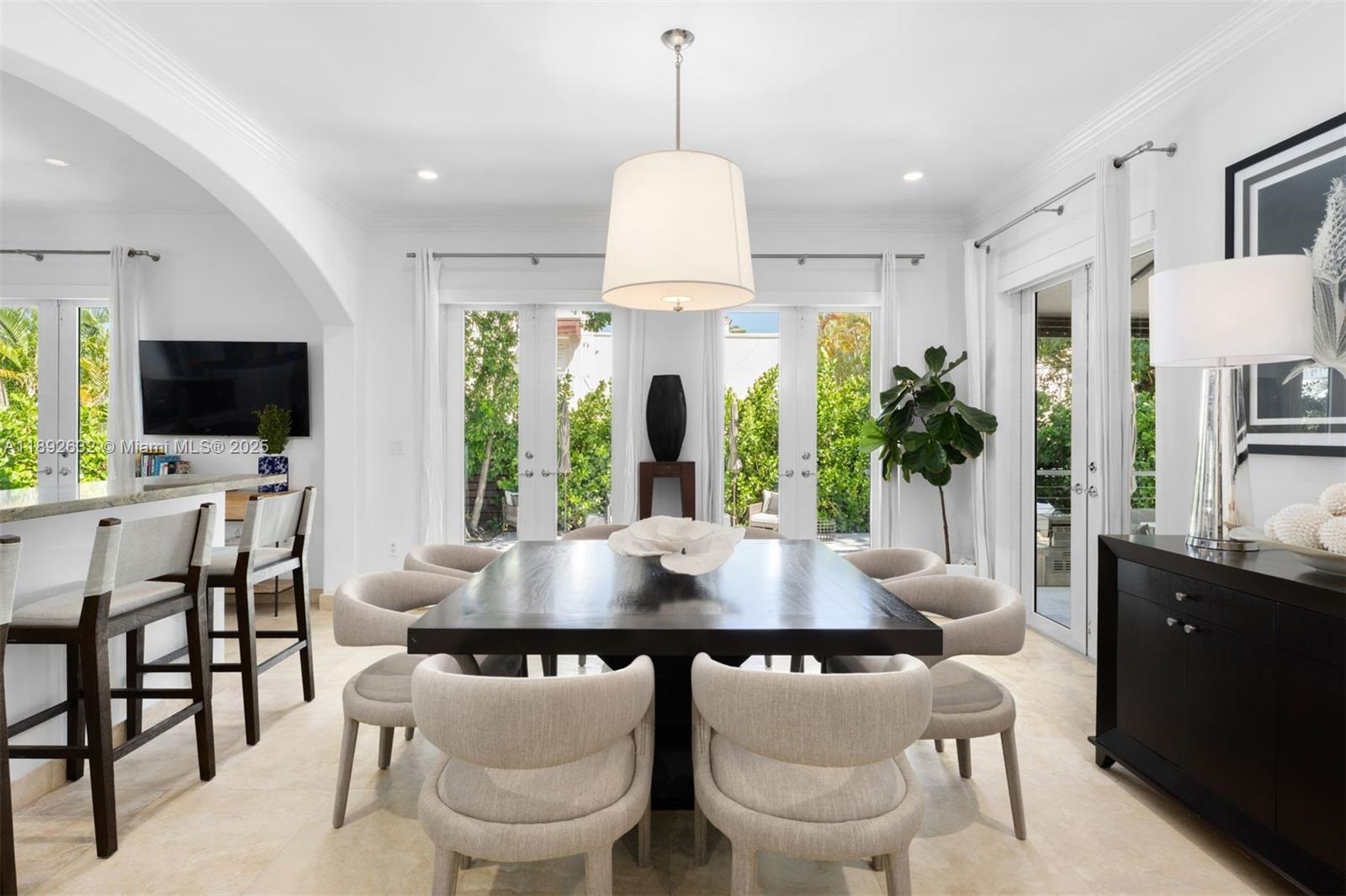 2143 North Bay Road Miami Beach, FL 33140 - Photo 14 of 39 a dining room with furniture and window