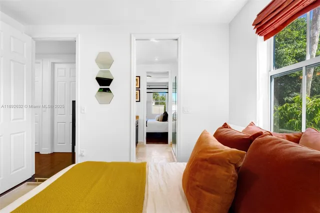 a en suite bathroom with double vanity sinks double vanity and a mirror