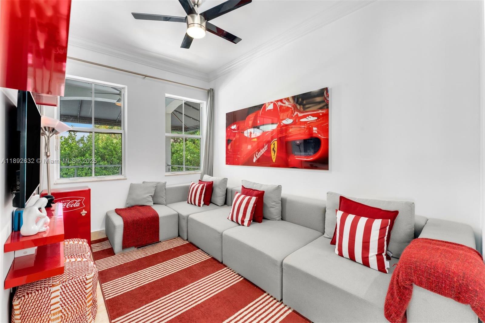 2143 North Bay Road Miami Beach, FL 33140 - Photo 34 of 39 a living room with furniture rug and window