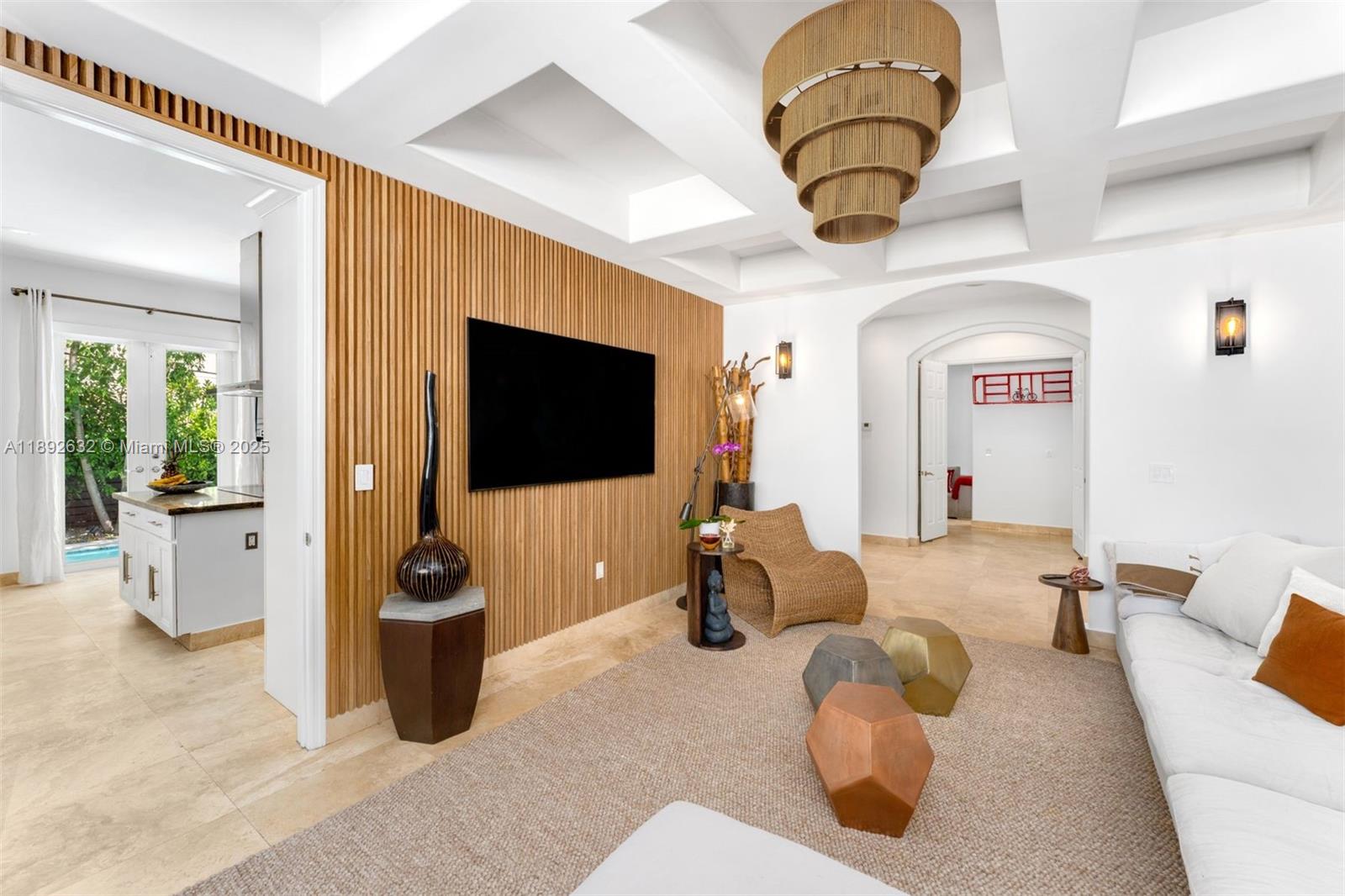2143 North Bay Road Miami Beach, FL 33140 - Photo 10 of 39 a living room with furniture and a flat screen tv