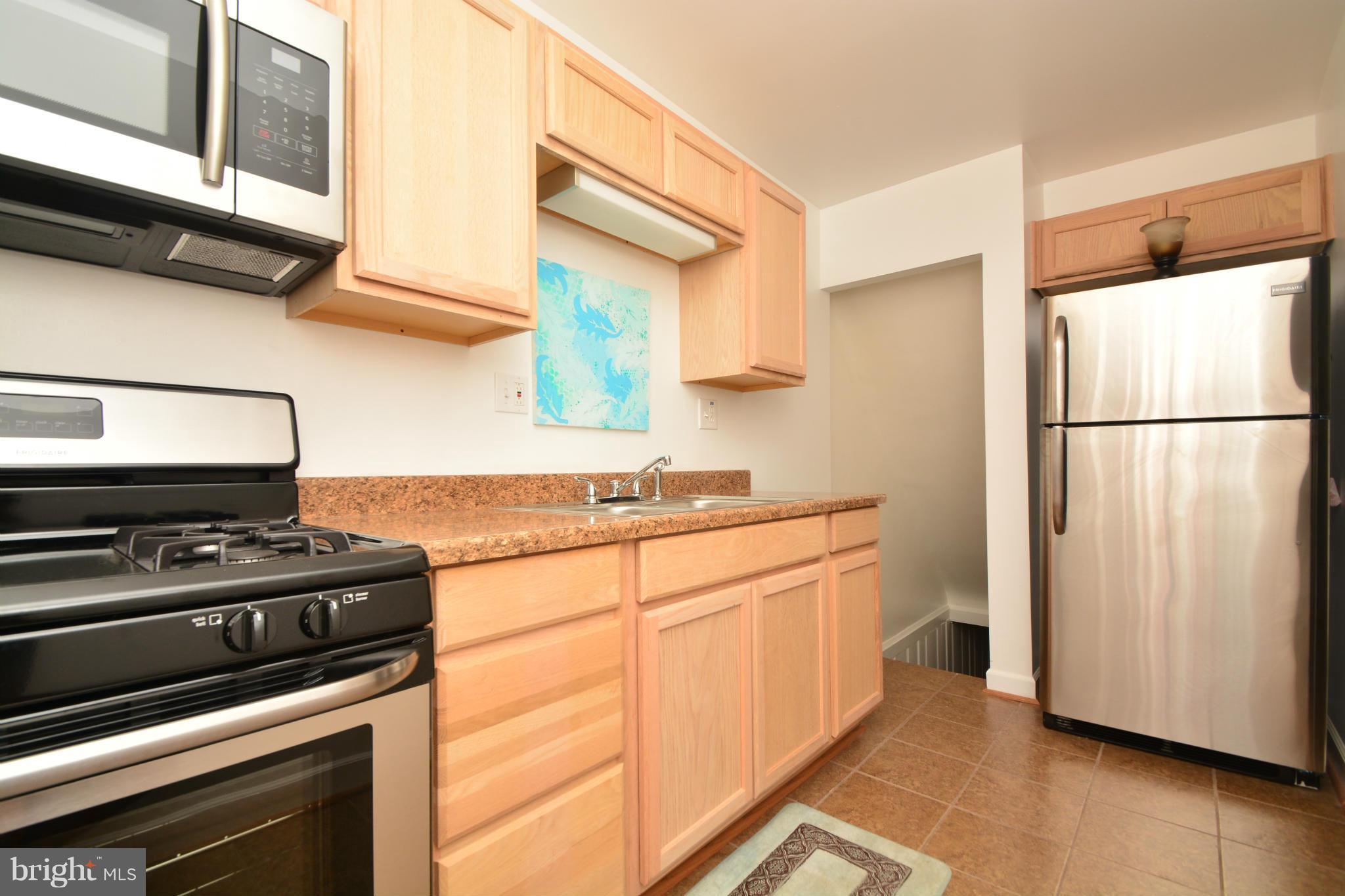 1029 Arncliffe Road Baltimore, MD 21221 - Photo 12 of 30 Kitchen w/ stainless steel appliances