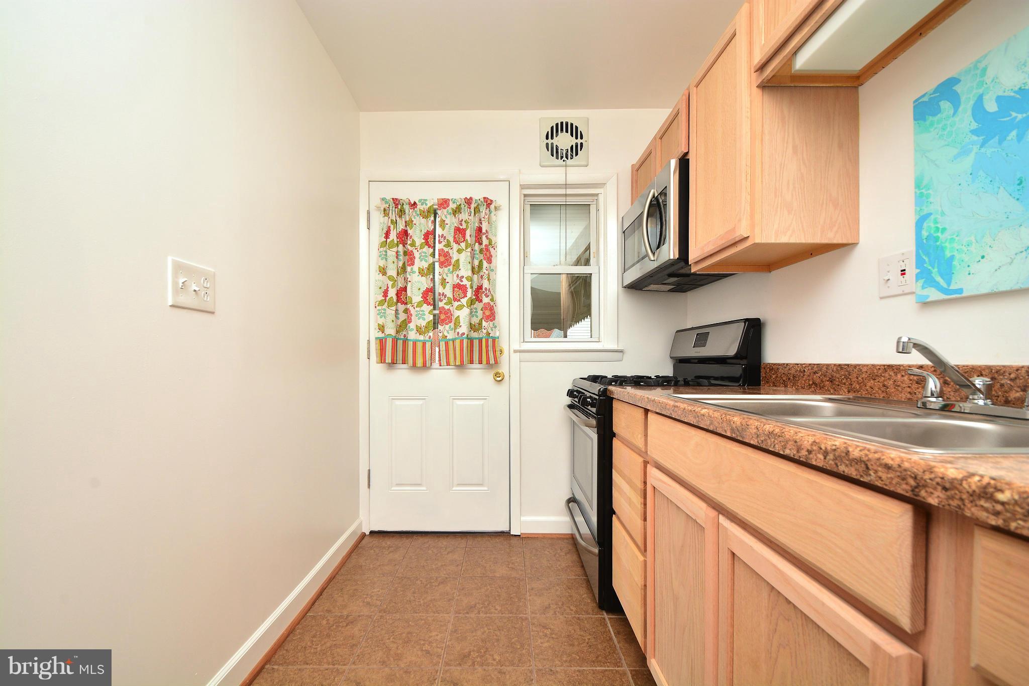 1029 Arncliffe Road Baltimore, MD 21221 - Photo 13 of 30 Kitchen with new tiled floor