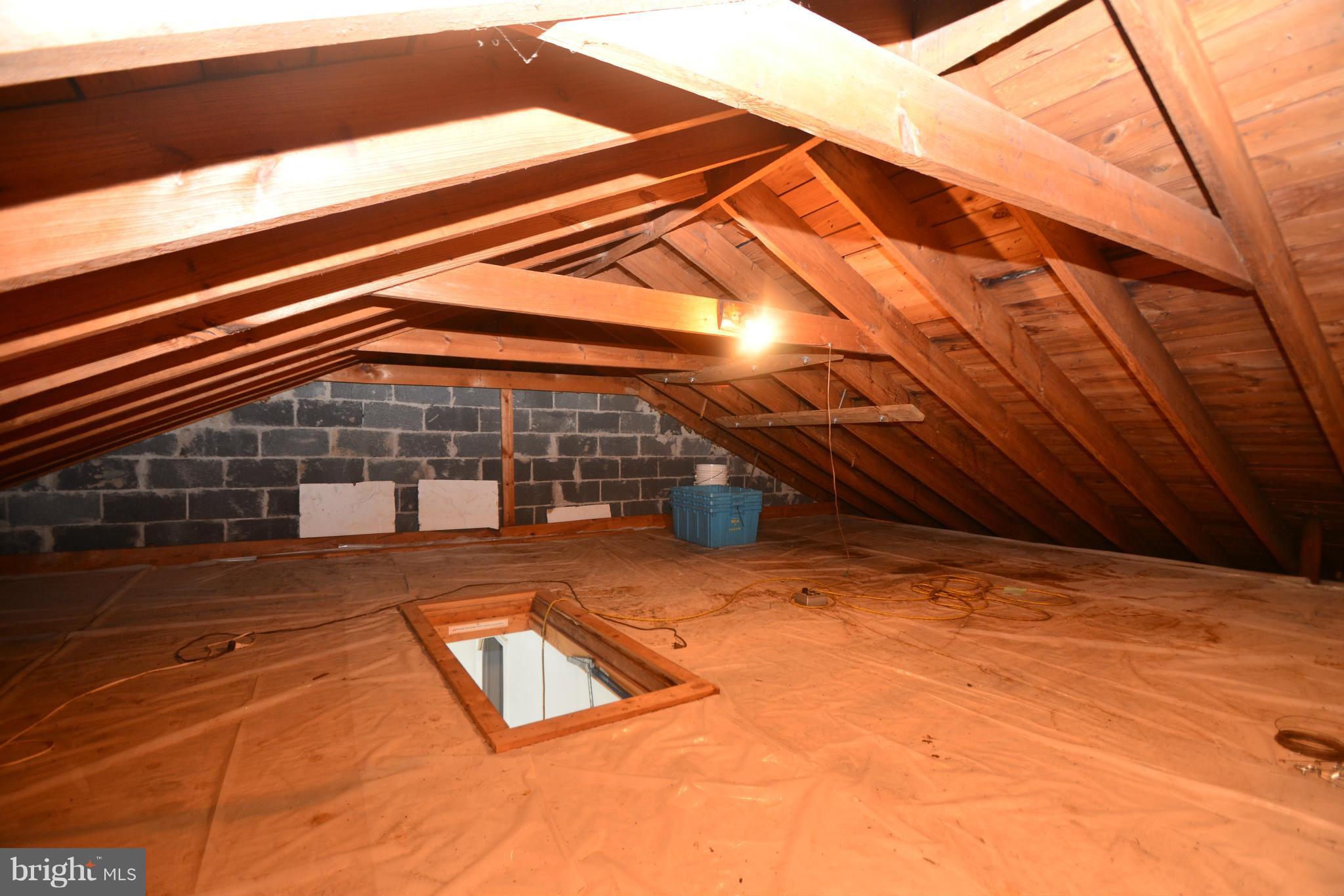 1029 Arncliffe Road Baltimore, MD 21221 - Photo 23 of 30 Floored attic with pull down stairs
