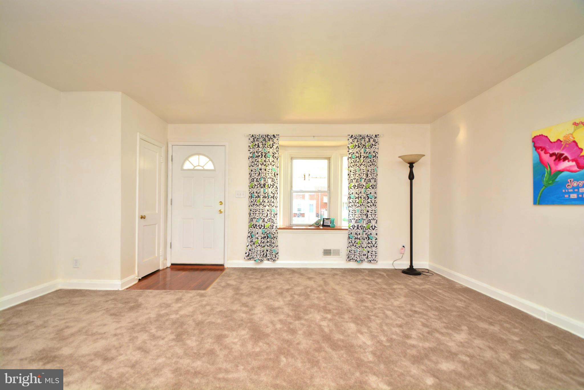 1029 Arncliffe Road Baltimore, MD 21221 - Photo 5 of 30 Living Room with hardwood entry