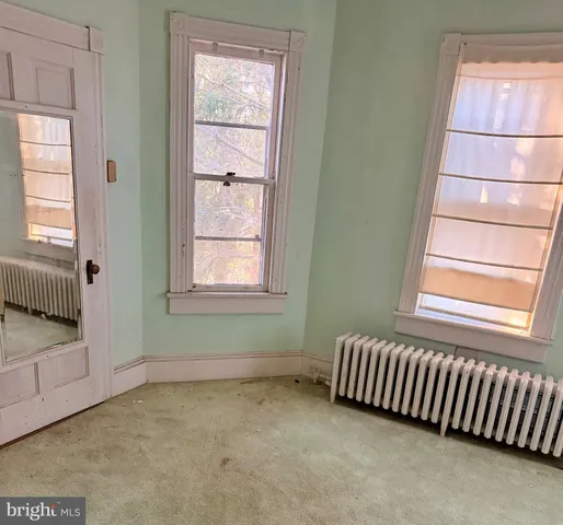 an empty room with a window