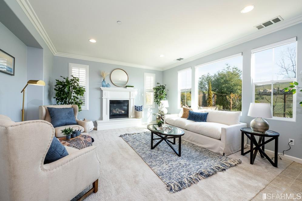 542 Labro Court San Ramon, CA 94582 - Photo 12 of 41 a living room with furniture fireplace and a large window