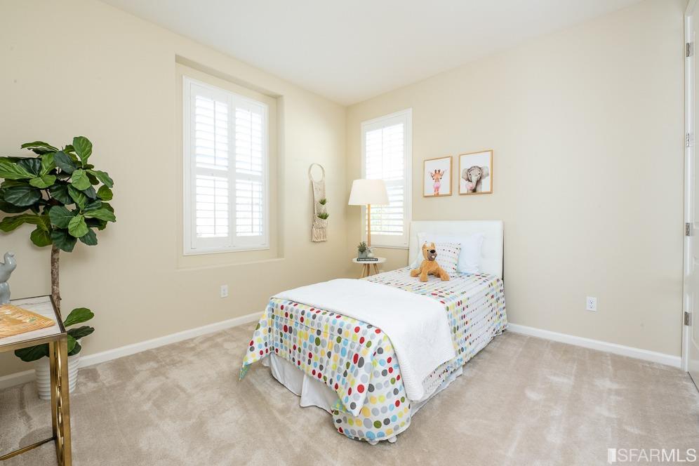 542 Labro Court San Ramon, CA 94582 - Photo 28 of 41 a bedroom with a bed and a window