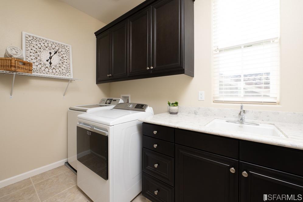 542 Labro Court San Ramon, CA 94582 - Photo 29 of 41 a utility room with a sink washer and dryer