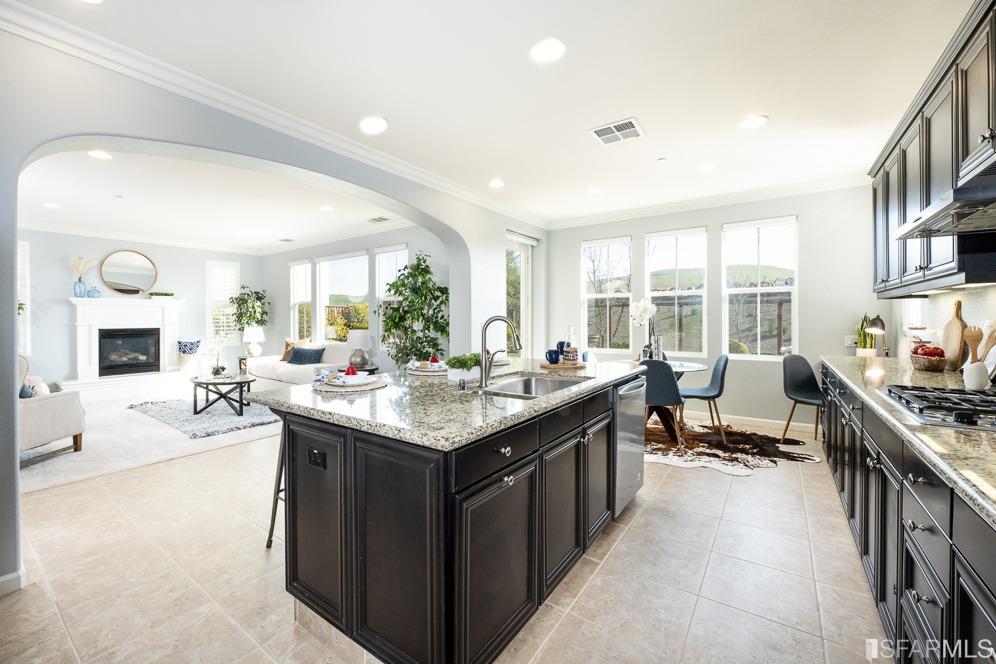 542 Labro Court San Ramon, CA 94582 - Photo 5 of 41 a kitchen with counter top space a sink cabinets and appliances