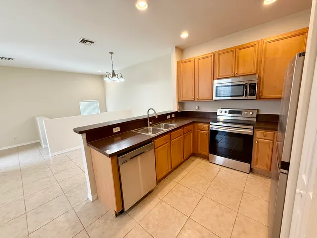 $245,000 | 3051 Southeast Lexington Lakes Drive, Unit 202, Stuart, FL 34994