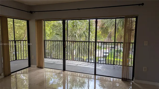 a kitchen with a refrigerator sink and microwave