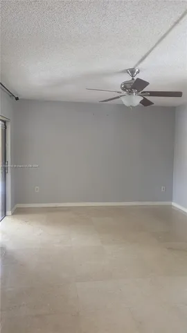 a view of a glass door and the balcony