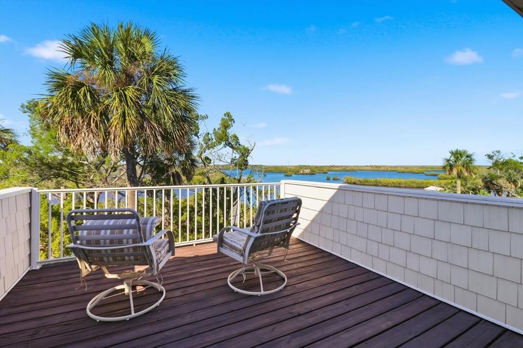 14211 West St Martins Road Crystal River, FL 34429 - Photo 30 of 60 a view of a deck with wooden floor and outdoor space