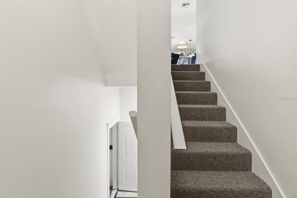14211 West St Martins Road Crystal River, FL 34429 - Photo 34 of 60 a view of a hallway with staircase