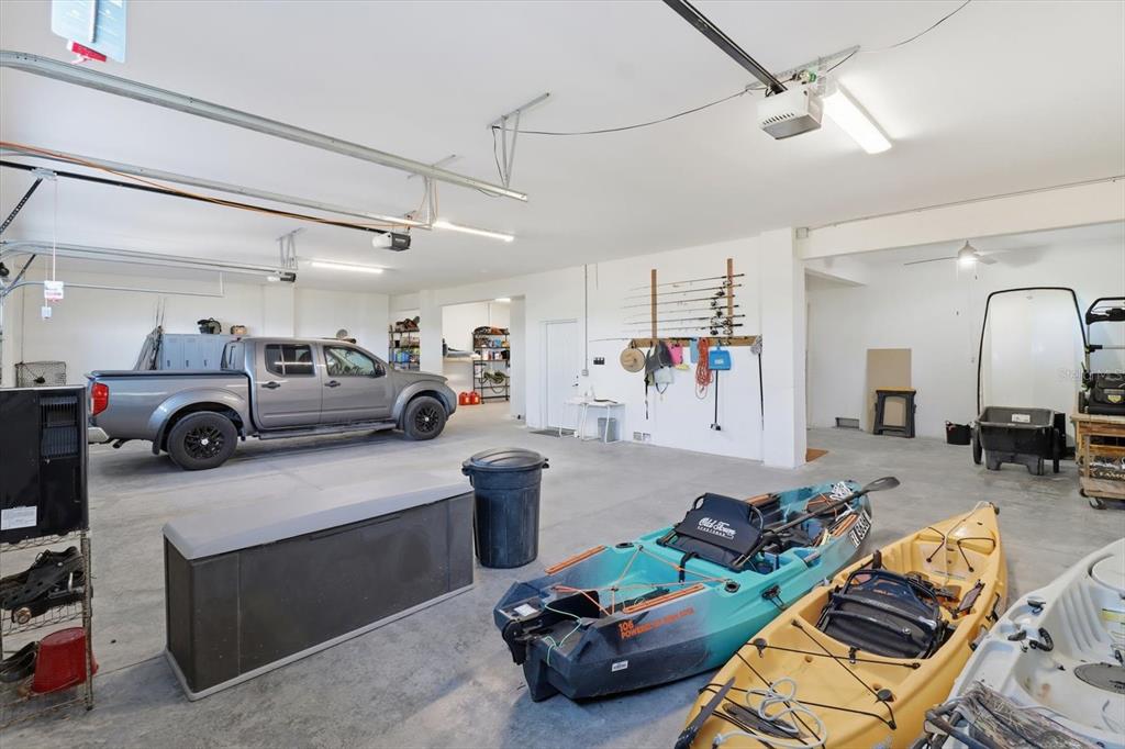 14211 West St Martins Road Crystal River, FL 34429 - Photo 39 of 60 a living room with furniture and a chandelier