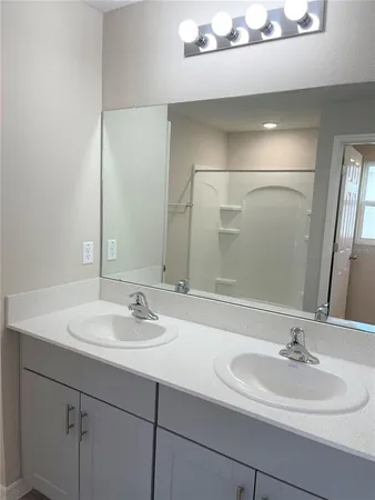 a bathroom with a shower and a toilet