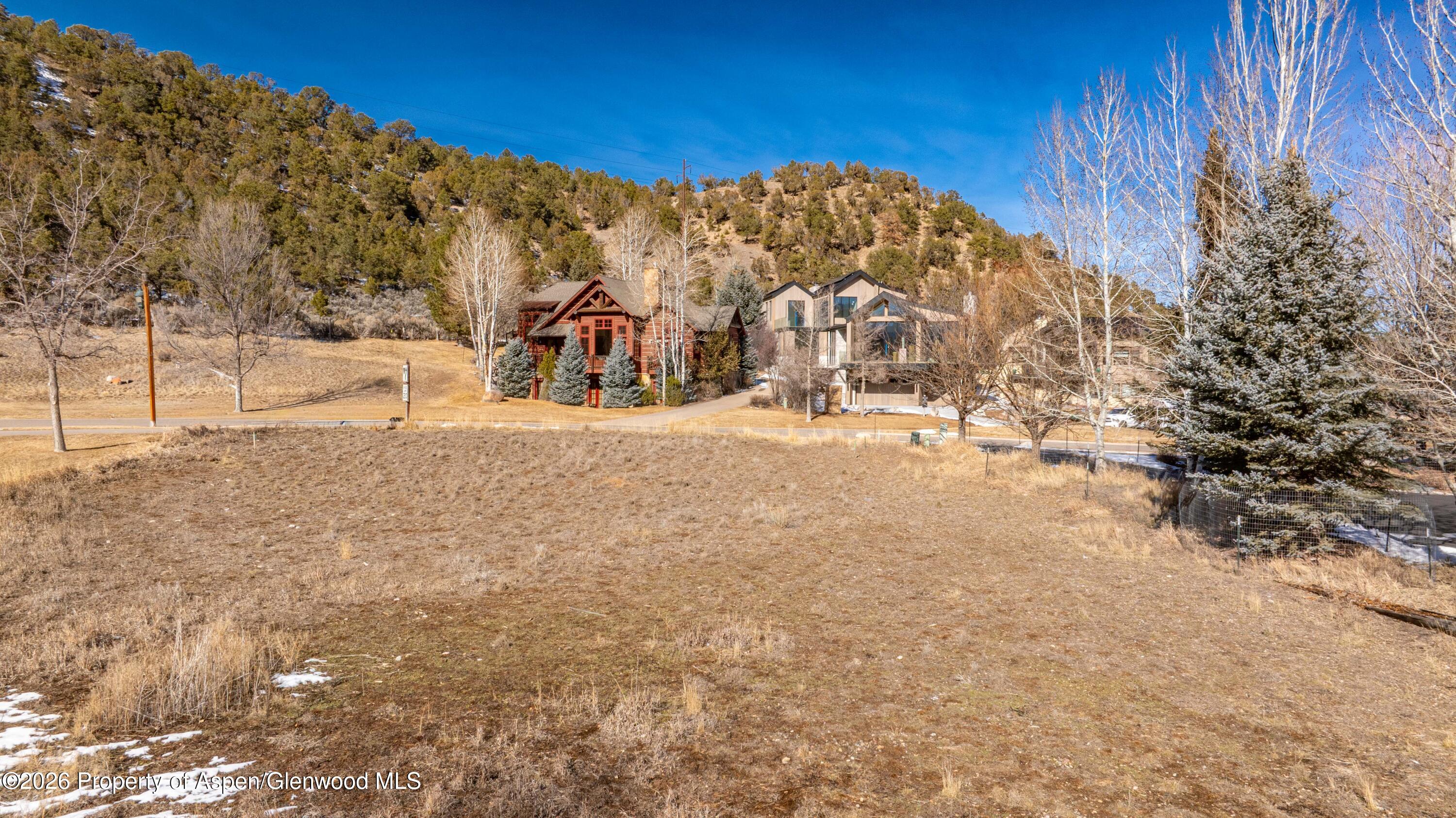 782 Perry Ridge Carbondale, CO 81623 - Photo 30 of 30 a view of a white house with a snow on the road