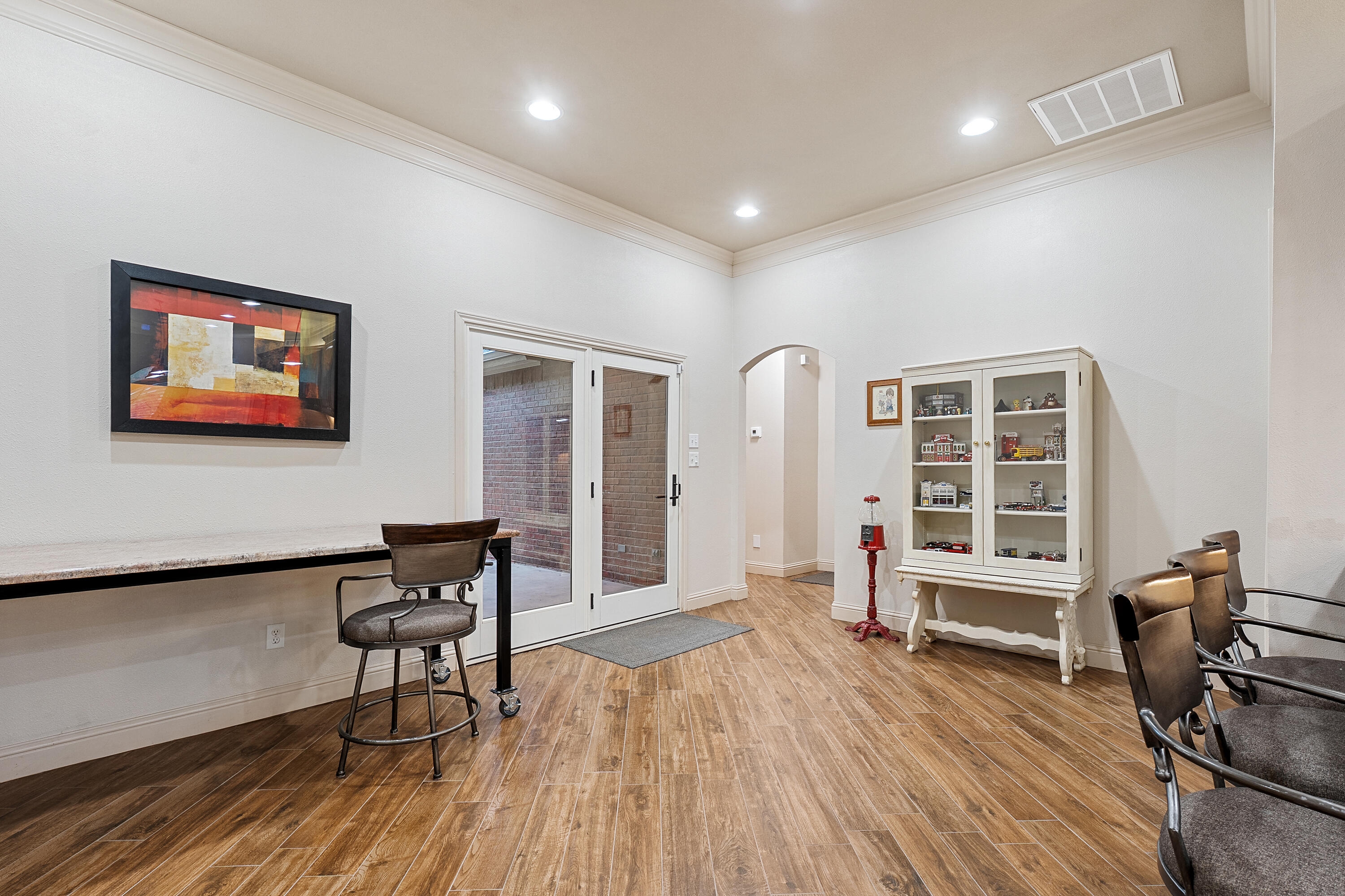 7502 Norfolk Avenue Lubbock, TX 79423 - Photo 15 of 41 a view of a livingroom with furniture and windows