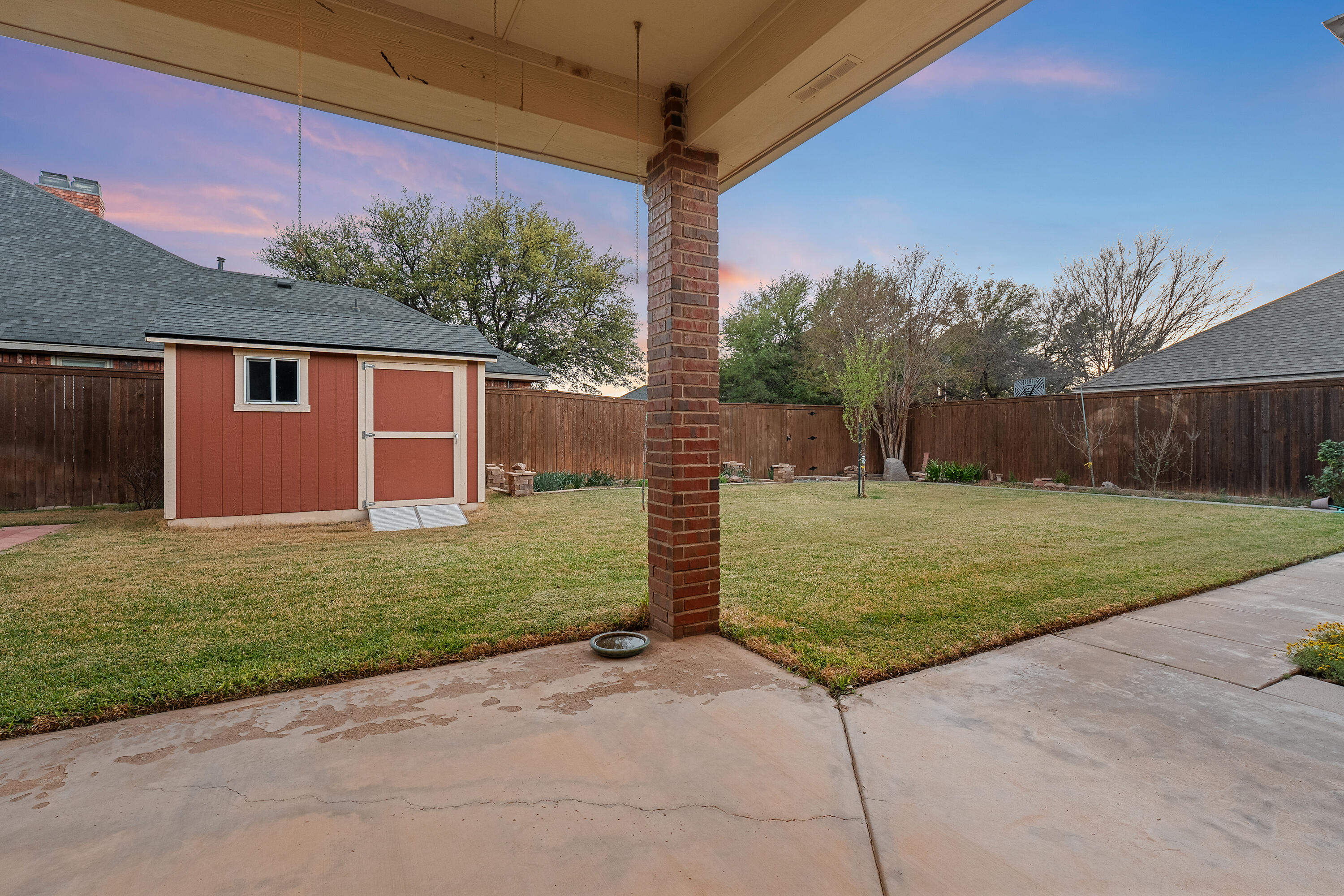 7502 Norfolk Avenue Lubbock, TX 79423 - Photo 37 of 41 a front view of a house with garden