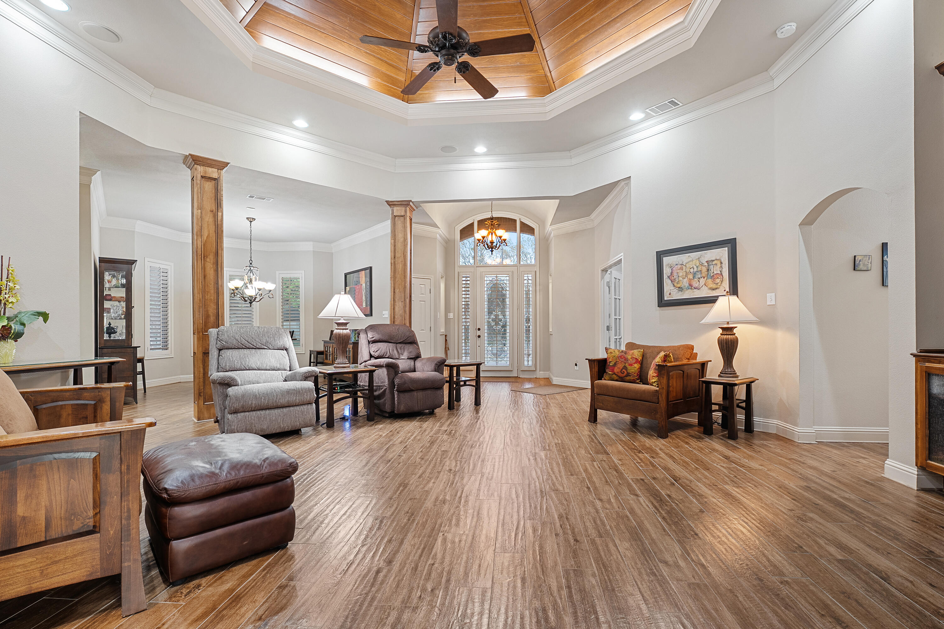 7502 Norfolk Avenue Lubbock, TX 79423 - Photo 5 of 41 a living room with furniture and wooden floor
