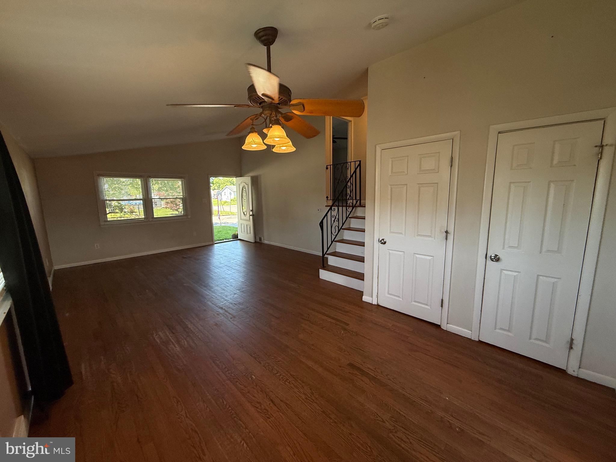 174 Kansas Road Pennsville, NJ 08070 - Photo 9 of 22 wooden floor in an empty room with a window