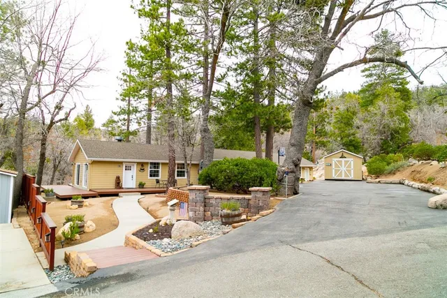 a view of a trees in front of a house