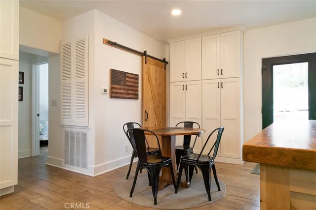 a house with trees in front of it