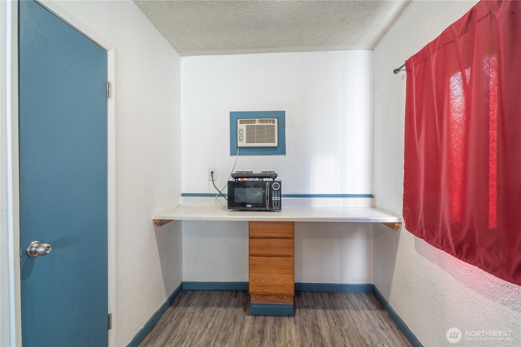 407 West 1st Avenue Ritzville, WA 99169 - Photo 15 of 26 a kitchen with a refrigerator and cabinets