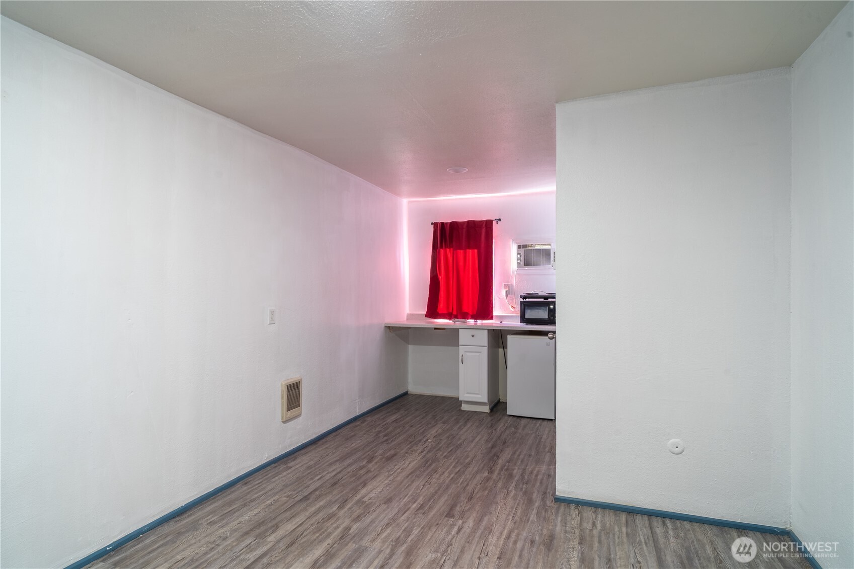 407 West 1st Avenue Ritzville, WA 99169 - Photo 10 of 26 a view of kitchen with wooden floor and window