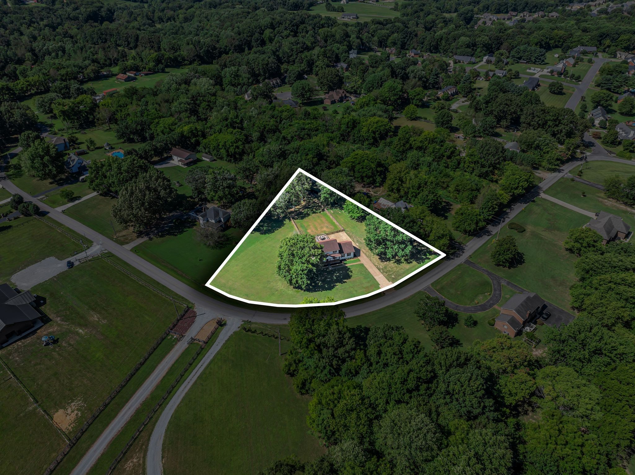 305 Lee Road Cottontown, TN 37048 - Photo 36 of 46 an aerial view of a house