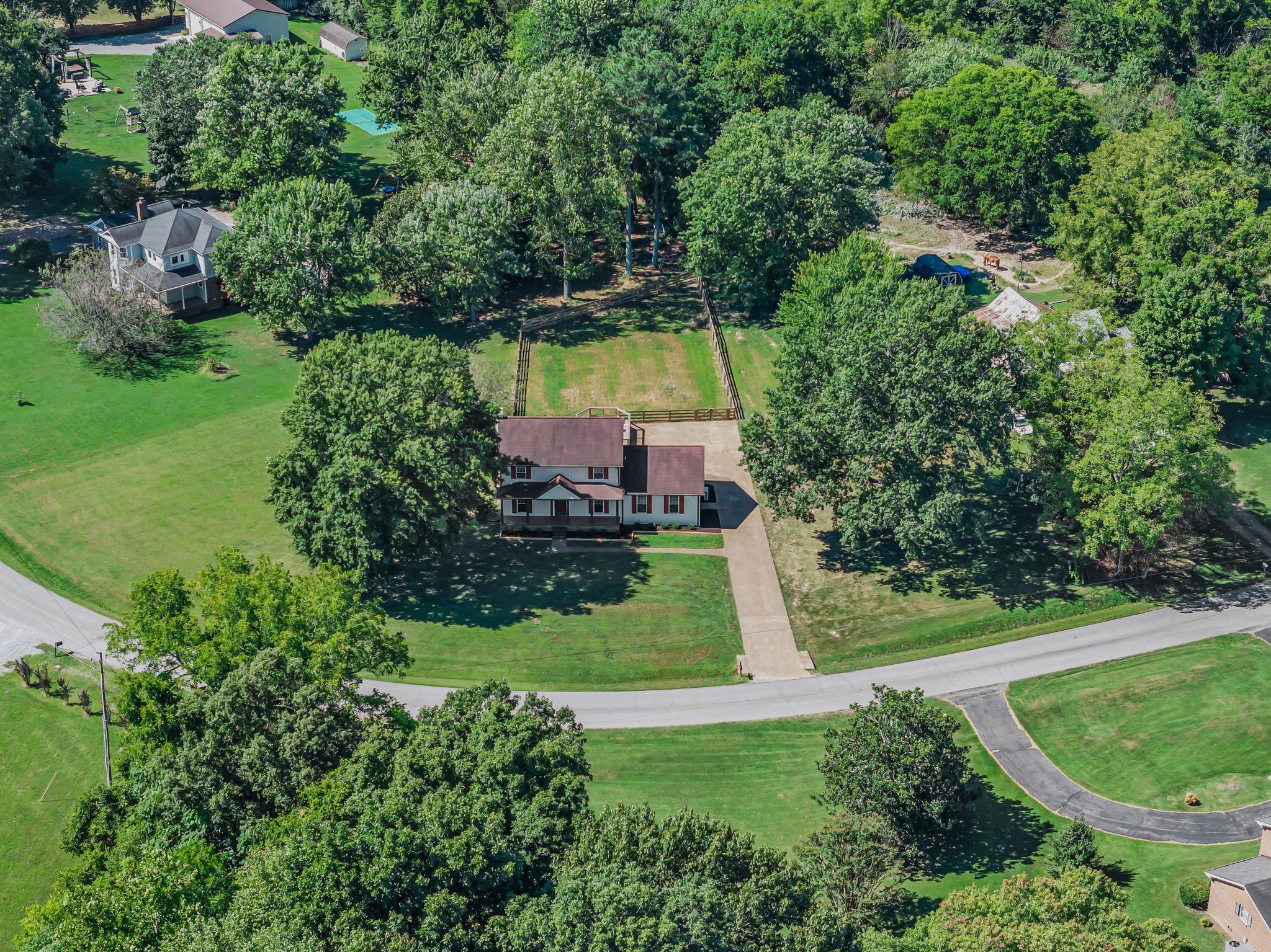 305 Lee Road Cottontown, TN 37048 - Photo 38 of 46 an aerial view of a house