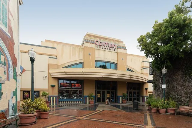a view of a building with sitting area
