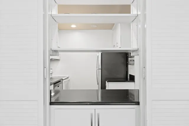 a bathroom with a sink and mirror