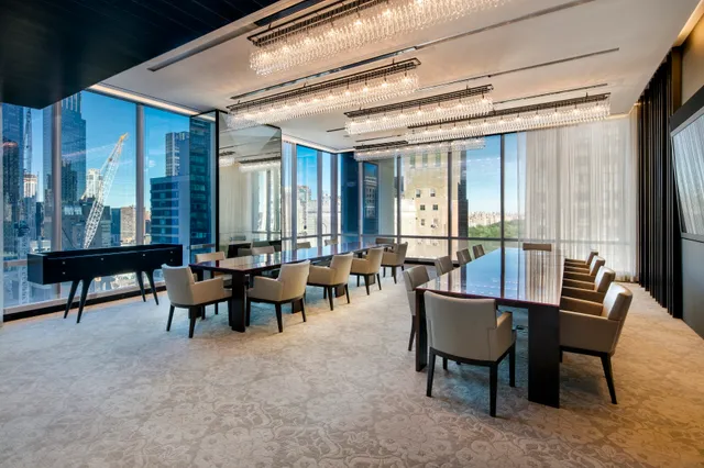 a view of a livingroom with furniture and window