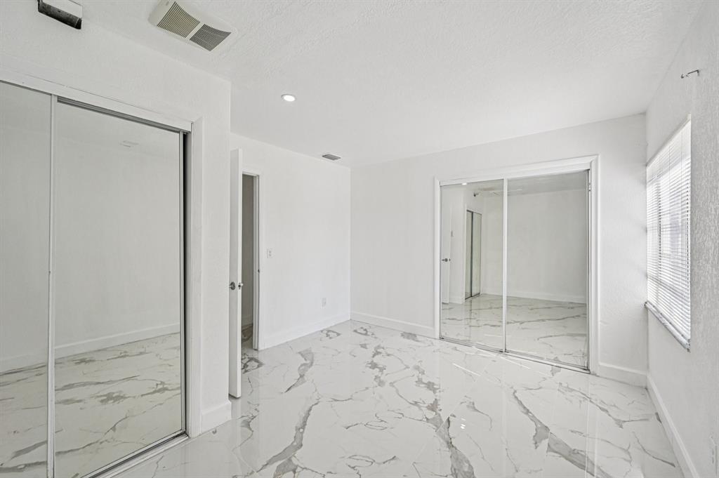 4549 Baldric Street Boca Raton, FL 33428 - Photo 23 of 43 a view of an empty room