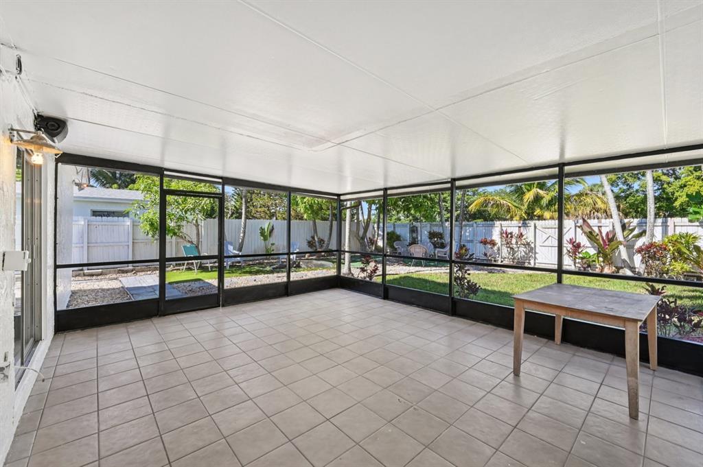 4549 Baldric Street Boca Raton, FL 33428 - Photo 41 of 43 a view of an empty room with windows