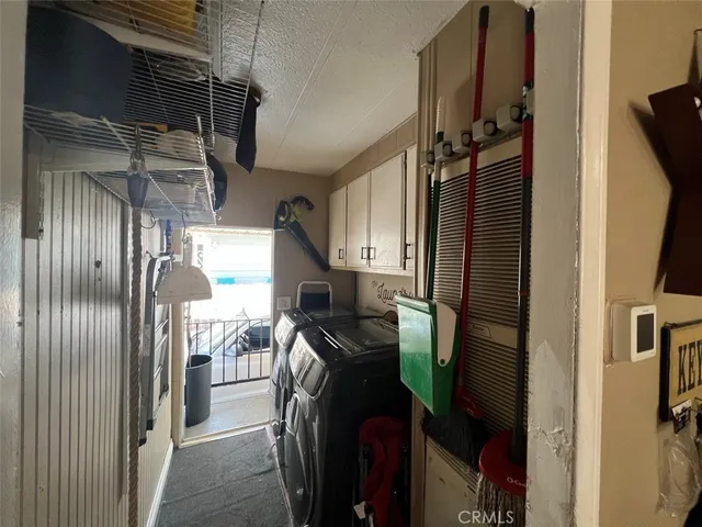 a view of storage and utility room