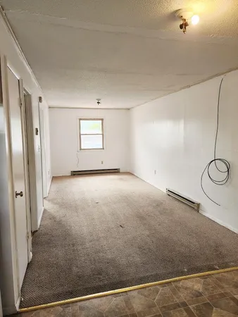 a view of a room with windows