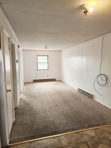 a view of a room with windows