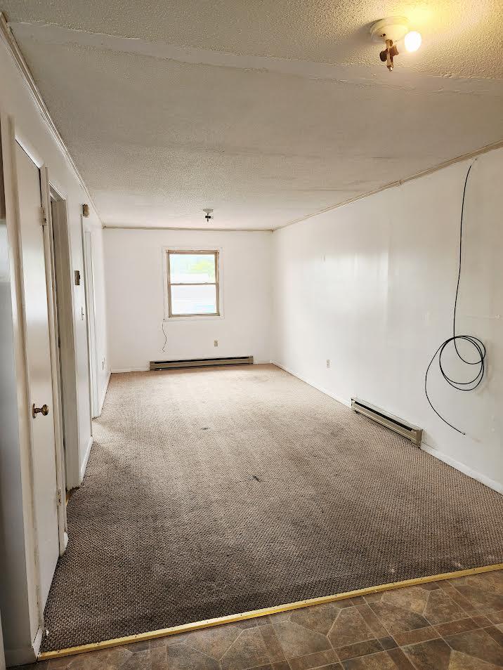 159 Bottom Road, Unit 4 Raven, VA 24639 - Photo 5 of 13 a view of a room with windows